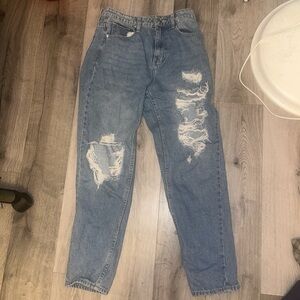 Women’s light wash denim jeans.